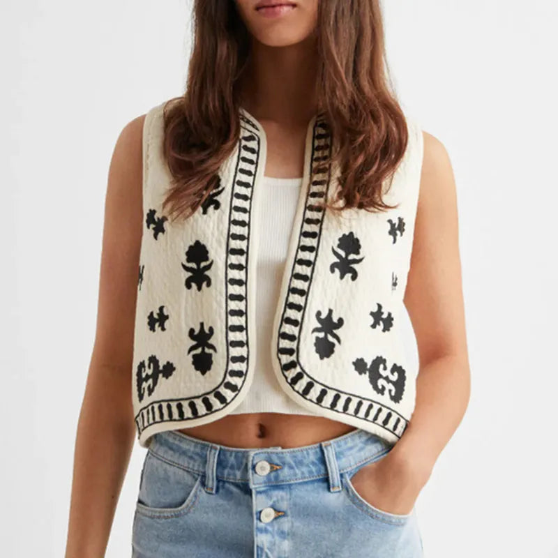 Women's vintage Christmas vest in cream with black floral patterns
