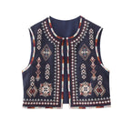 Women's vintage Christmas vest in navy, crafted for holiday gatherings.
