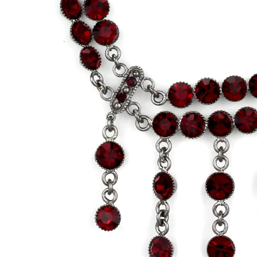 Vintage inspired silver jewelry necklace with red gemstones and intricate details