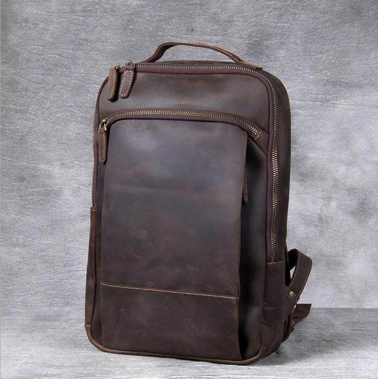 Vintage leather backpack from VacationGrabs with sleek design and multiple compartments