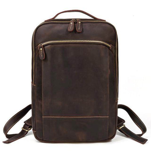 Vintage leather backpack by VacationGrabs featuring a sleek design and multiple compartments