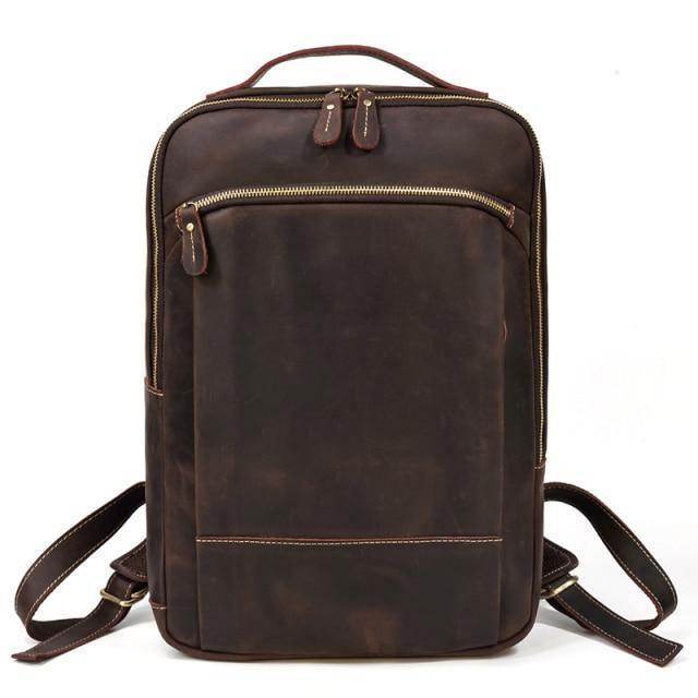 Vintage leather backpack by VacationGrabs featuring a sleek design and multiple compartments
