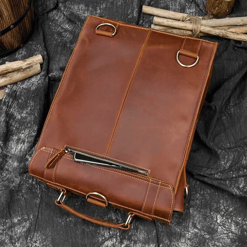 Vintage leather backpack with a sleek design and functional zipper detail for stylish travel