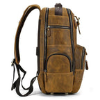 Side view of a vintage leather backpack with multiple pockets and sturdy straps for stylish travel