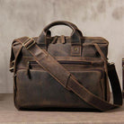 Vintage leather briefcase with multiple pockets and an adjustable shoulder strap