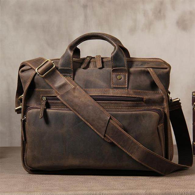Vintage leather briefcase with multiple pockets and an adjustable shoulder strap