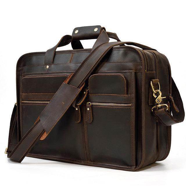 Vintage leather briefcase with multiple pockets and an adjustable shoulder strap for professionals