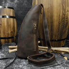 Vintage leather chest bag in dark brown, ideal for travel