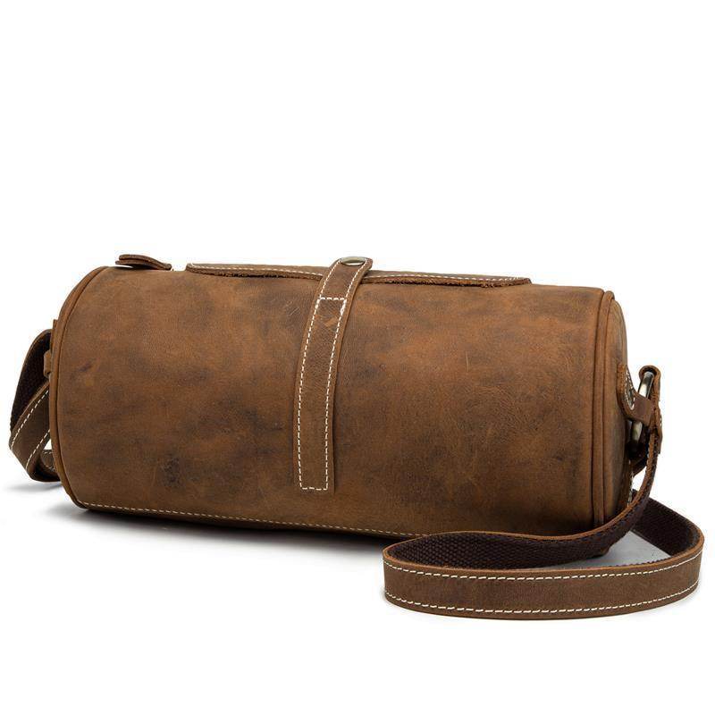 VacationGrabs vintage leather crossbody bag with a cylindrical shape and adjustable strap for casual outings