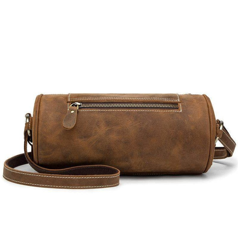 Vintage leather crossbody bag with a classic design and adjustable shoulder strap for casual use