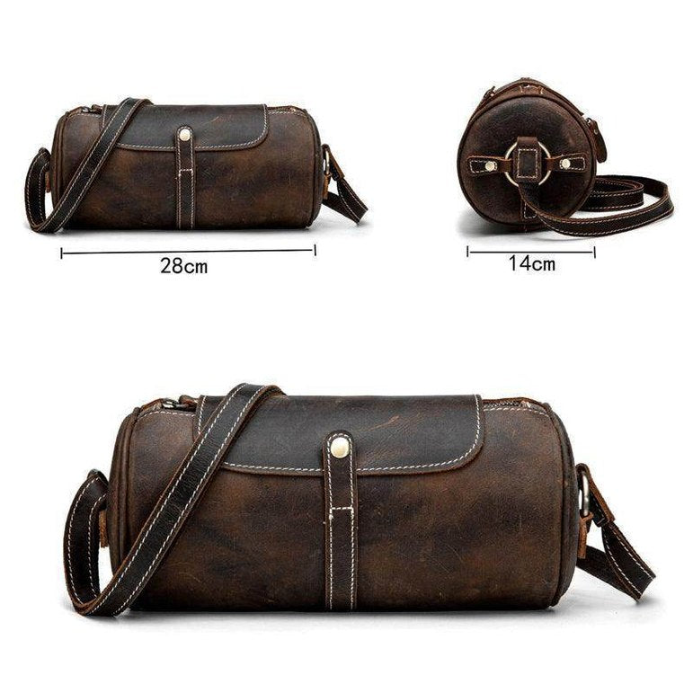 Vintage leather crossbody bag in a cylindrical shape with adjustable shoulder strap and stylish design