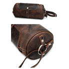 Vintage leather crossbody bag featuring a round design with sturdy strap and multiple pockets