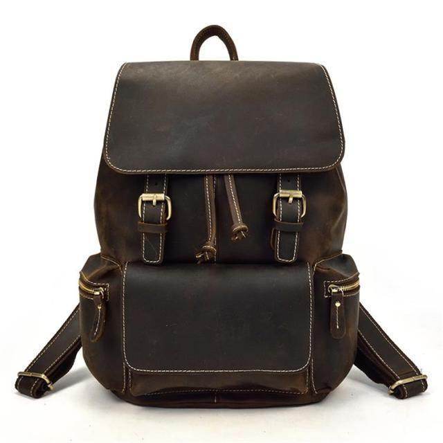 Vintage leather laptop backpack with adjustable straps and multiple pockets for convenience