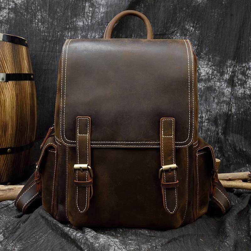 Vintage leather laptop backpack from VacationGrabs with sturdy buckles and rustic design