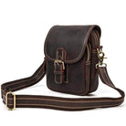 Vintage leather sling bag with adjustable strap and multiple compartments for everyday use