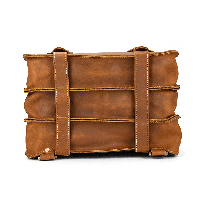 Vintage leather travel backpack with dual straps and spacious compartments for easy carrying