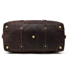 Vintage leather travel bag from VacationGrabs with durable brass hardware and spacious design