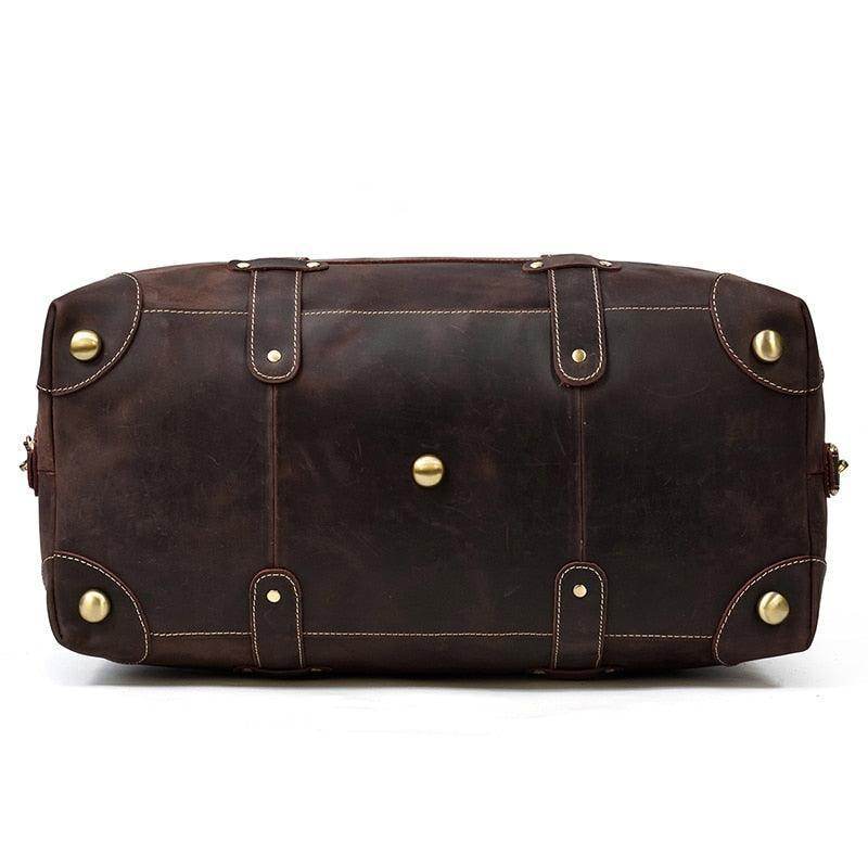 Vintage leather travel bag from VacationGrabs with durable brass hardware and spacious design