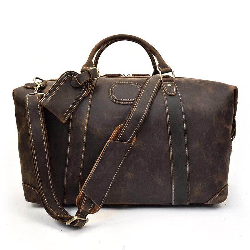 Vintage leather travel bag by VacationGrabs with durable construction and spacious design for all your journeys