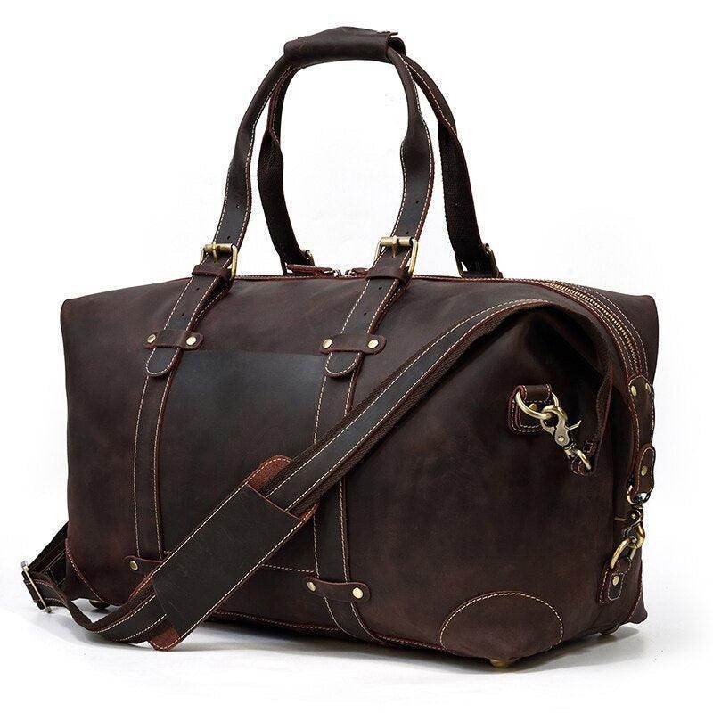 Vintage leather travel bag by VacationGrabs with sturdy handles and a spacious interior for your adventures