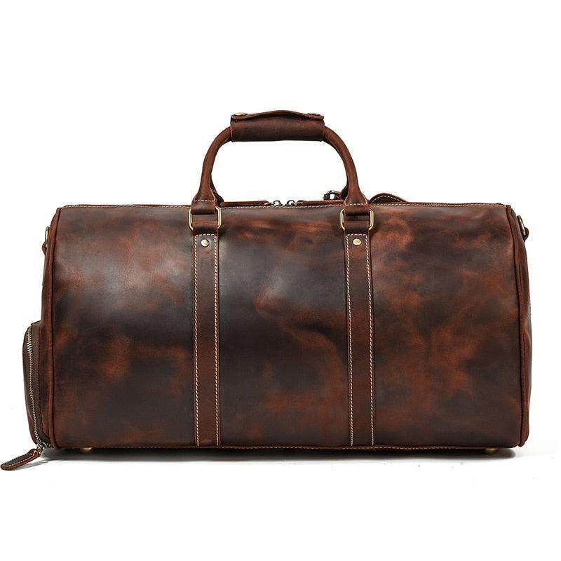 Vintage leather travel duffle bag with sturdy handles and spacious interior for weekend getaways