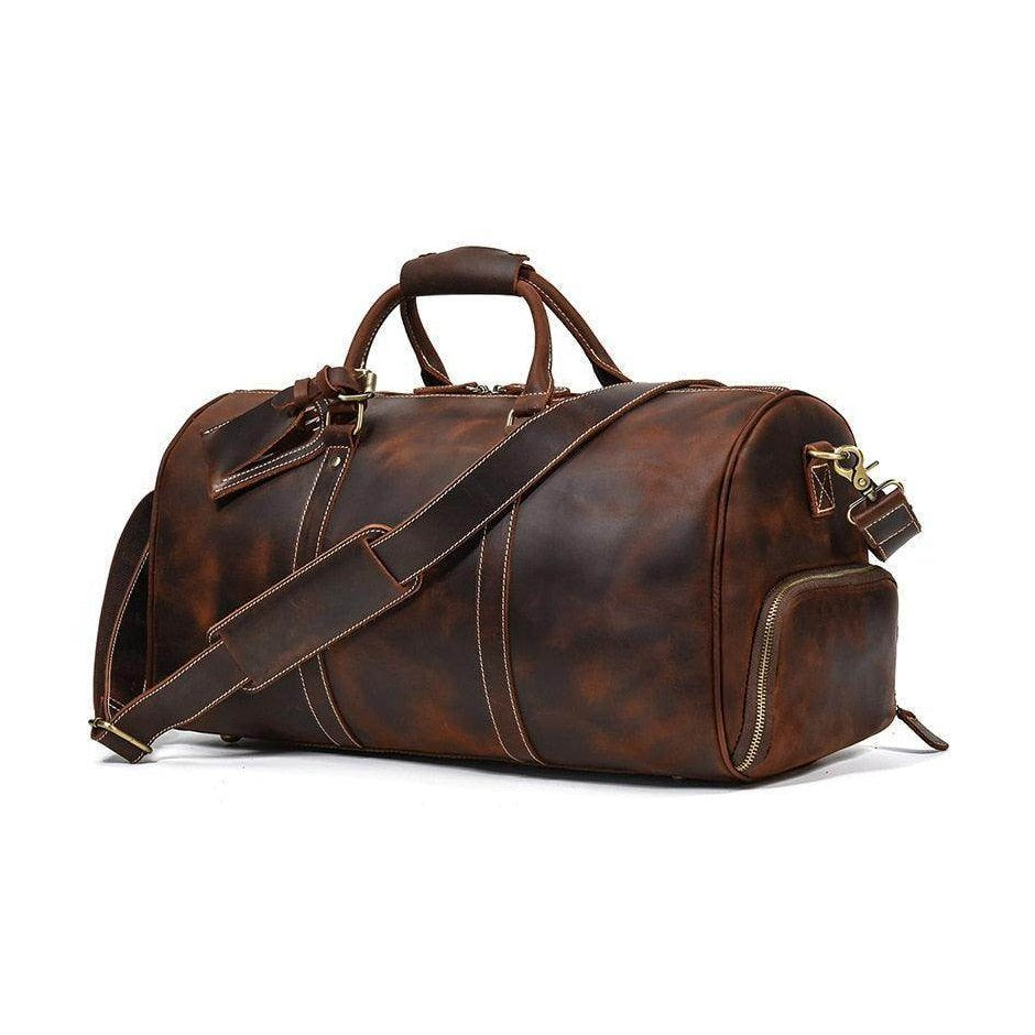 Vintage leather travel duffle bag with sturdy handles and adjustable shoulder strap for stylish journeys