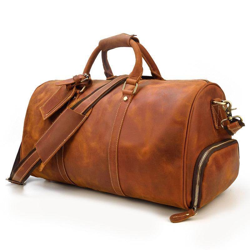Vintage leather travel duffle bag with spacious interior and detachable shoulder strap for easy carrying