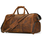 Vintage leather travel duffle bag with adjustable strap and multiple compartments for organized packing