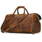 Vintage leather travel duffle bag with adjustable strap and multiple compartments for organized packing