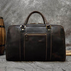 Vintage leather weekender bag with durable handles, ideal for travel and weekend getaways