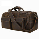 Vintage leather weekender bag with multiple pockets and sturdy handles for travel convenience