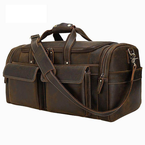 Vintage leather weekender bag with multiple pockets and sturdy handles for travel convenience