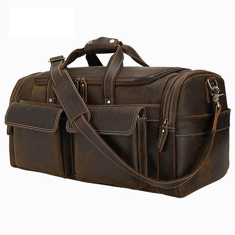 Vintage leather weekender bag with multiple pockets and sturdy handles for travel convenience