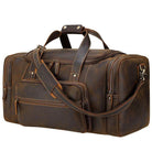 Vintage leather weekender bag with spacious compartments and sturdy handles for travel convenience