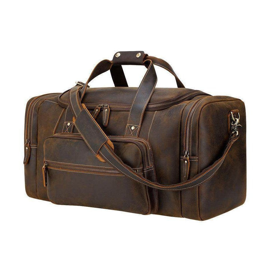 Vintage leather weekender bag with spacious compartments and sturdy handles for travel convenience