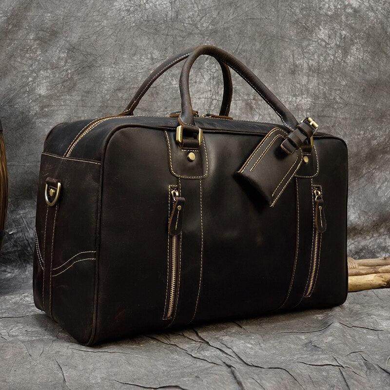 Vintage leather weekender bag by VacationGrabs with sturdy handles and stylish zipper pockets