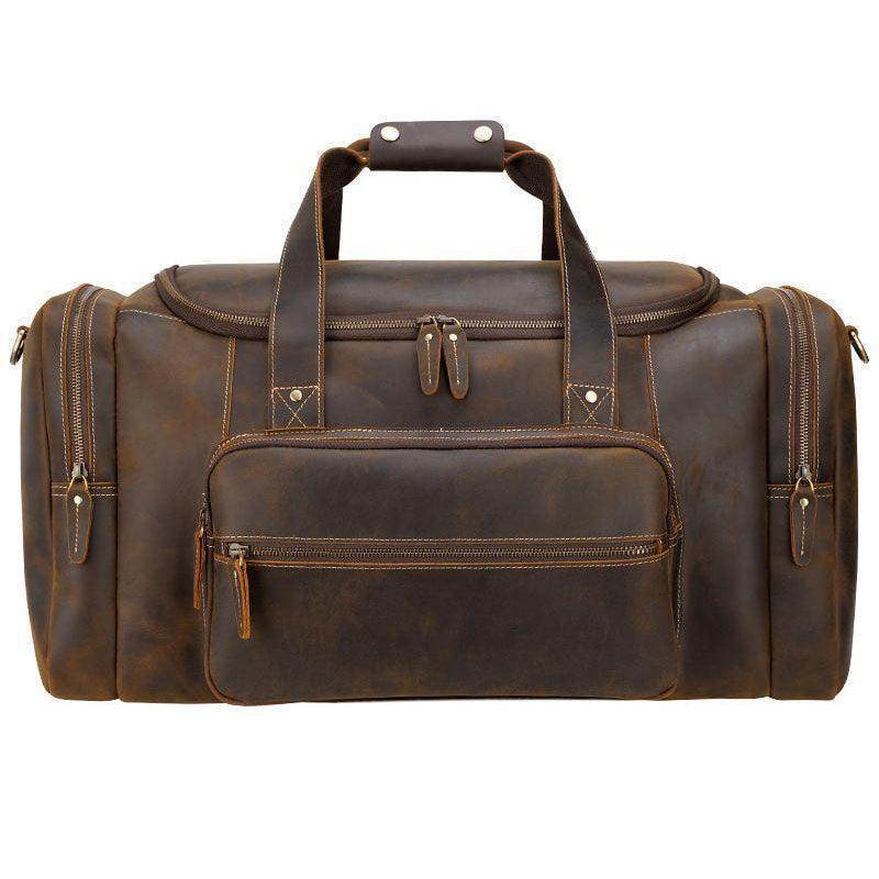 Vintage leather weekender bag with dual handles and front zipper pocket for stylish travel