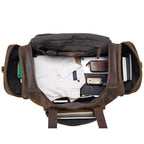 Vintage leather weekender bag with spacious interior and organized compartments for travel essentials