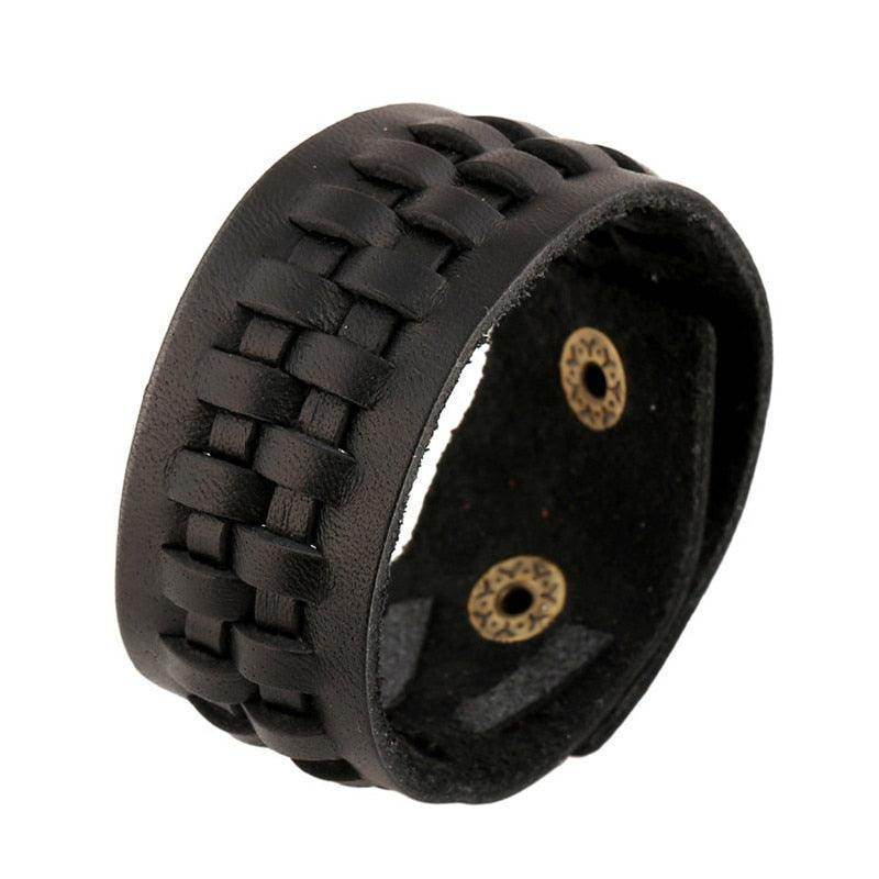 Vintage punk wristband for men made of woven black leather with antique brass studs