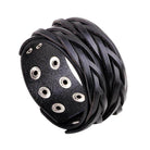 Vintage punk wristband for men made of braided black leather with silver eyelets