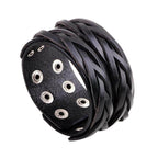 Vintage punk wristband for men made of braided black leather with silver eyelets