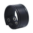 Vintage punk wristband for men in black leather with metal studs, perfect for trendy outfits