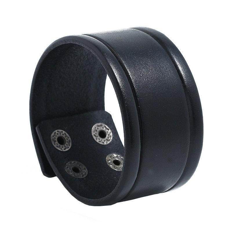 Vintage punk wristband for men in black leather with metal studs, perfect for trendy outfits