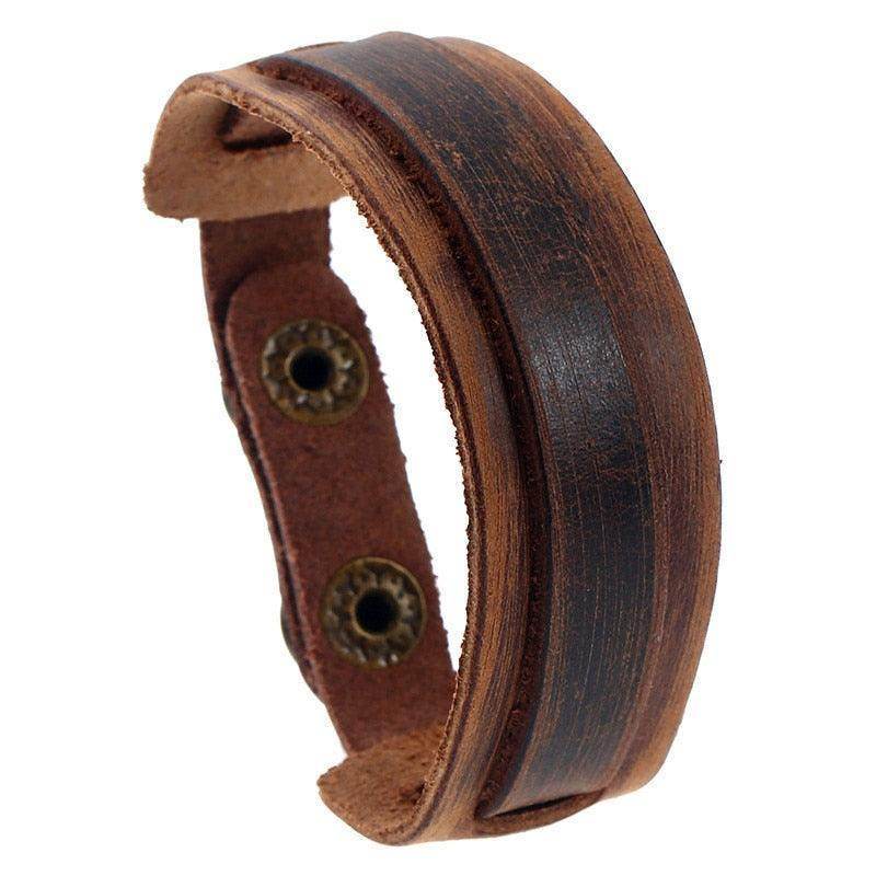 Vintage punk wristband for men made of leather with a distressed finish and adjustable snap closure