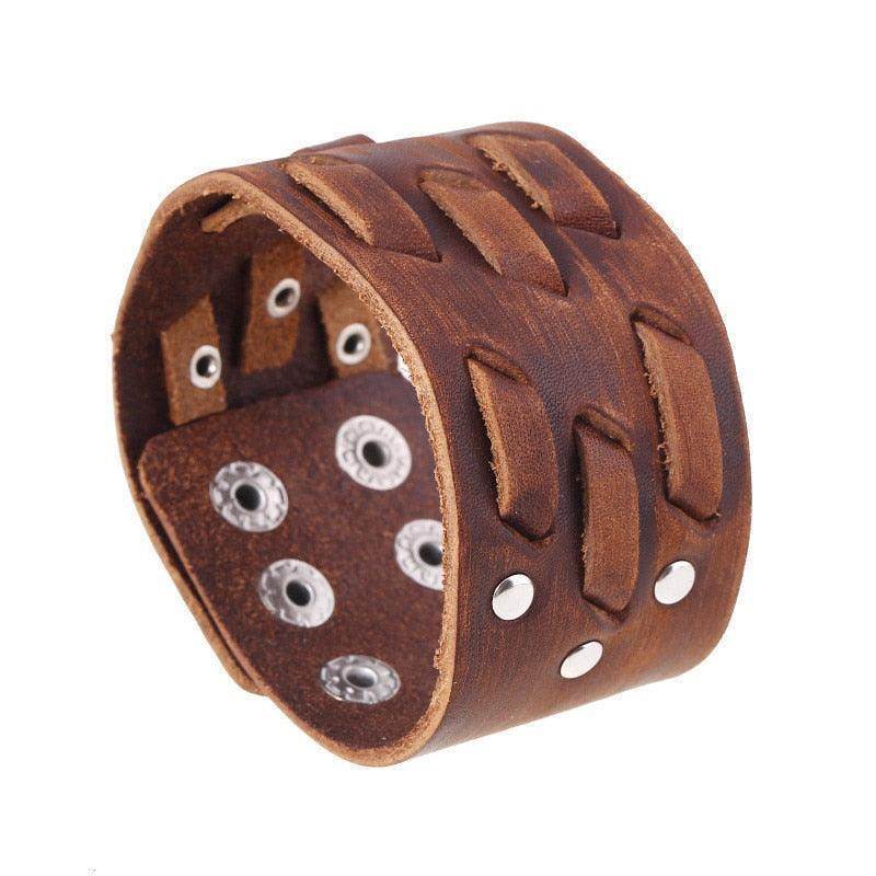 Stylish vintage punk wristband for men made of brown leather with metal embellishments