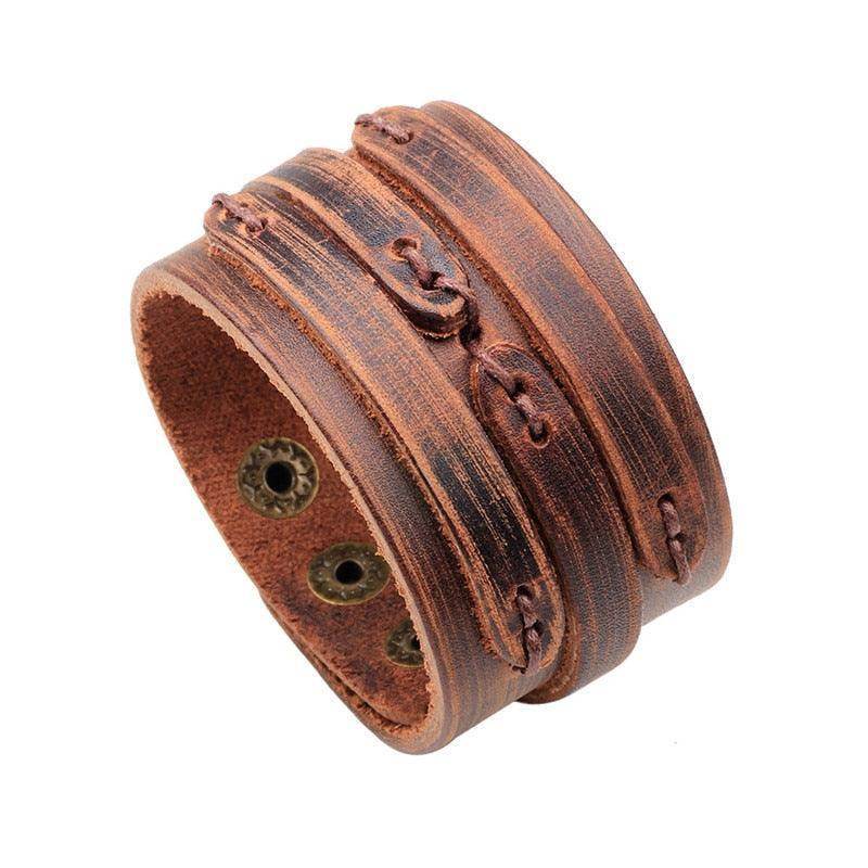 Vintage punk wristband for men made of leather with unique stitching details and a stylish rustic look