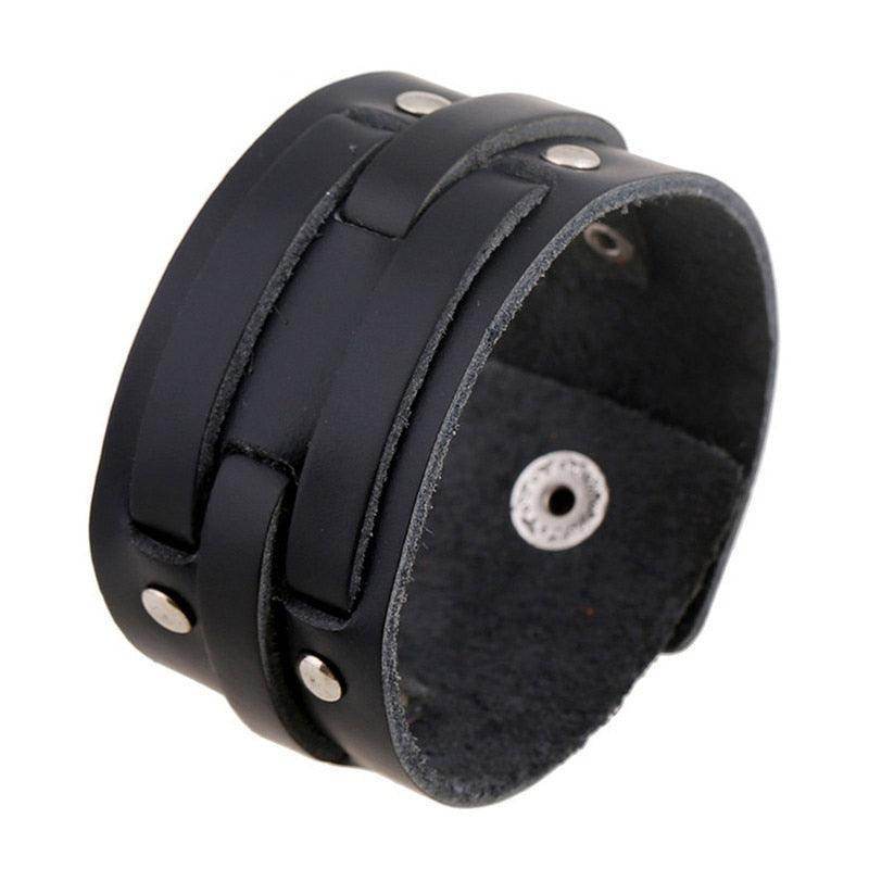 Vintage punk wristband for men in black leather with stylish metal studs for a bold look