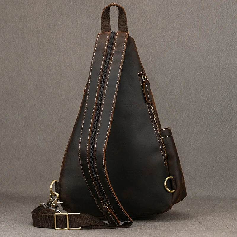 Brown leather vintage style sling bag for men with adjustable strap and stylish design