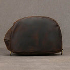 Vintage style sling bag for men in brown with a sleek design and durable material