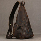 Vintage style sling bag for men made from durable leather with multiple zippered pockets